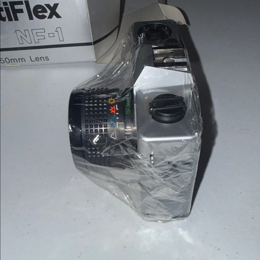 OptiFlex NF-1 35mm Film Camera with 50mm Lens Silver Black and Case